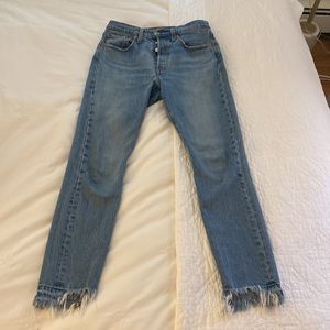 LEVI’s premium size 26 501 skinny light wash with frayed bottoms